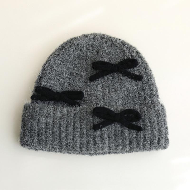 Bow Knitted Woolen Hat for Women In Autumn and Winter Warm and Versatile Thickened Ear Protection Face Showing Small Cold Hat