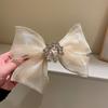 Fermaglio per capelli a fiocco con strass in organza alla moda per acconciature sulla nuca Fermaglio Eleganti Accessori per Capelli per Donne