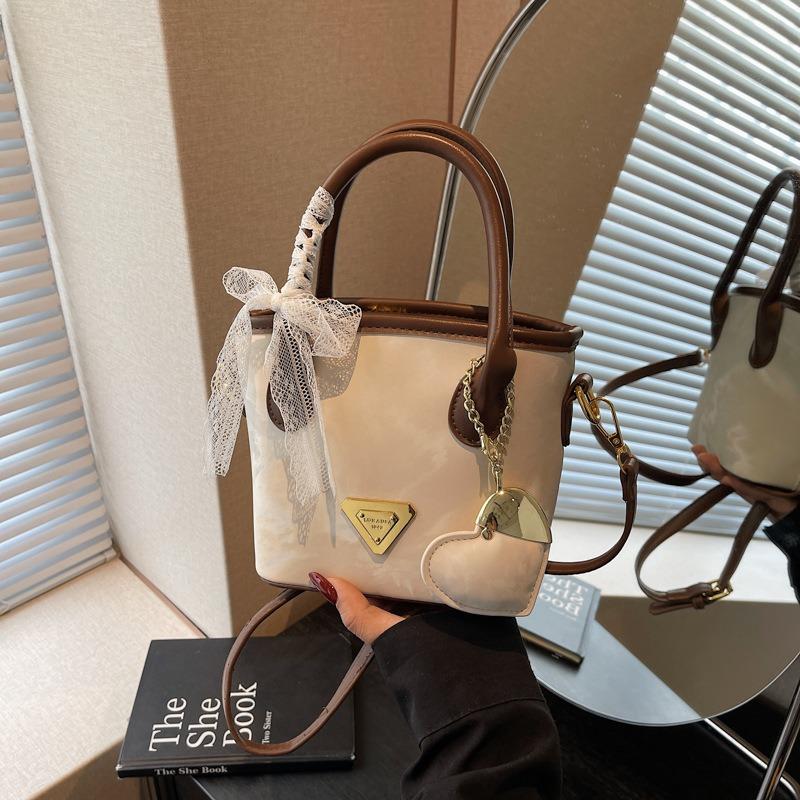Nuova piccola borsa estiva da donna alla moda a tracolla messenger borsa a secchiello portatile popolare ora