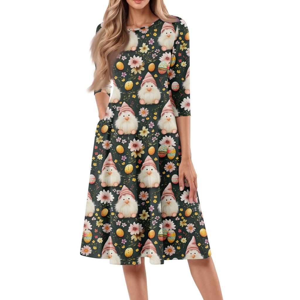 Dámské volné ležérní a módní šaty střední délky s potiskem, kulatým výstřihem a sedmčtvrtečními rukávy