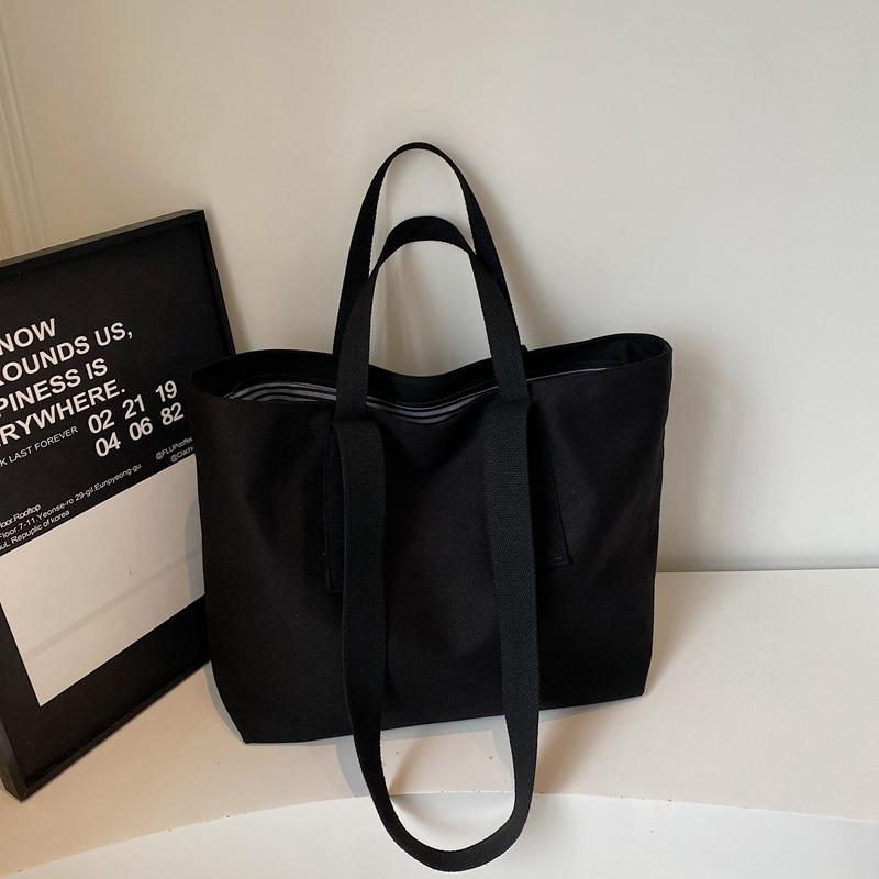 2025 summer new fashion simple solid color portable tote bag lazy wind commuting large capacity shoulder canvas bag