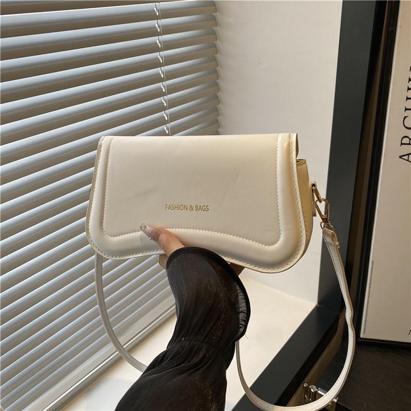 Textured hand-held underarm bag summer new fashion messenger bag solid color commuter retro shoulder bag women