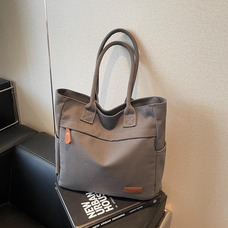 Casual large-capacity canvas bag women's new fashion commuter versatile shoulder bag college student tote bag