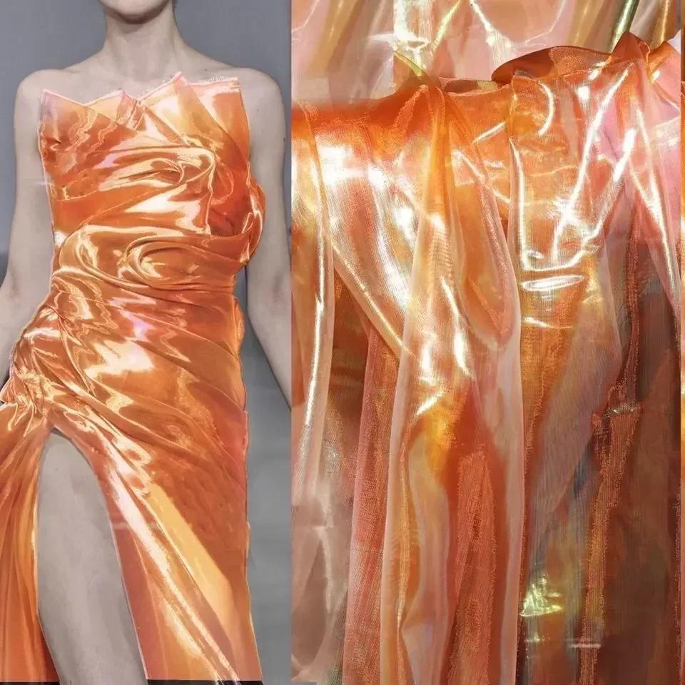 Buntes glitzerndes Netzgewebe Illusionäre Farbfotografie Hintergrund Transparentes Gaze-Kleid Performance-Kleidung Stoff