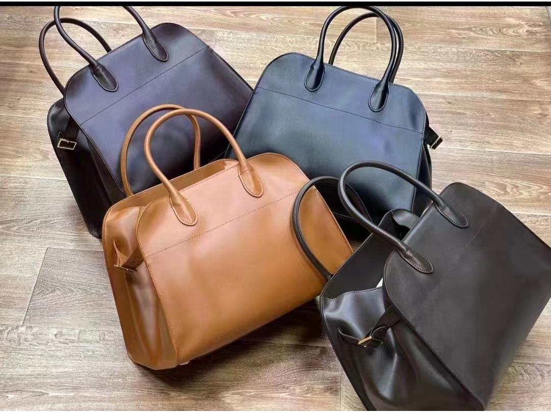 

Сумка-тоут Margaux15 из коровьей кожи — вместительная, простая, универсальная сумка в стиле Dong Jie 15-inch with Logo: 38*27*24cm