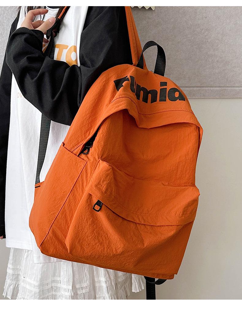 Lightweight Minimalist Backpack for Female Students: Versatile Double-Shoulder Bag for School and Travel.