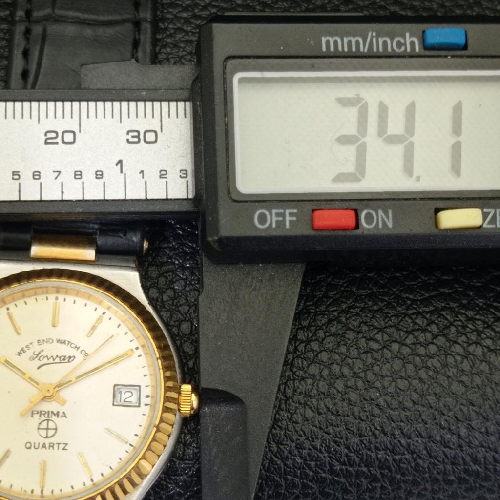 VINTAGE WEST END WATCH CO QUARTZ SWISS WOMENS CREAM COLOR DIAL WATCH A700338-5