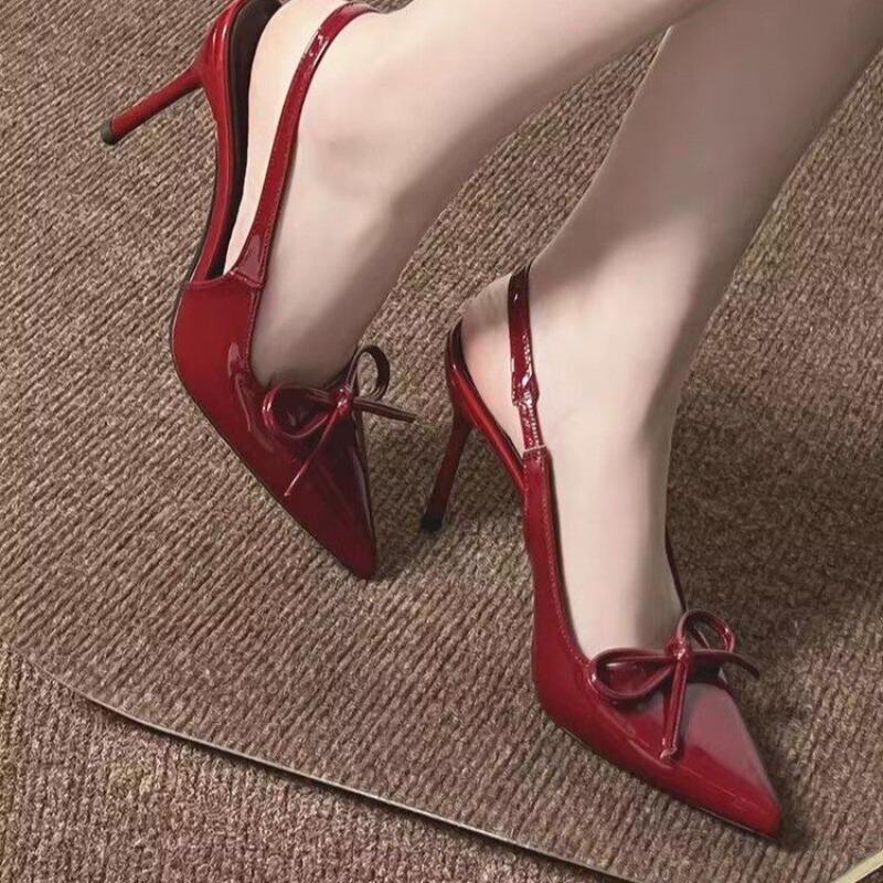 Evening breeze beautiful bow high heels women's summer new pointed thin heel light mouth fairy wind bag head sandals
