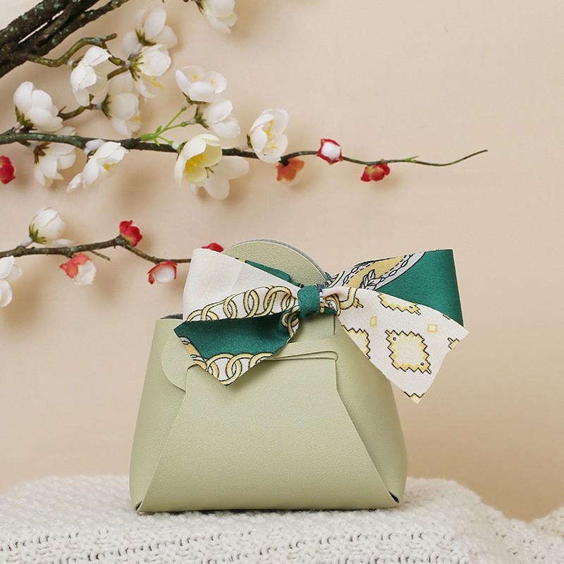 20 Stück Leder Geschenkbeutel Schleife Verpackungsbeutel Hochzeitsgeschenk Verteilungsbeutel Süßigkeiten Verpackungsbox Rosa Mini-Handtasche