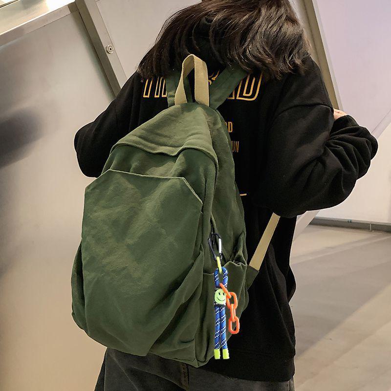 2025 Durable Canvas Solid Color Backpack for Female College Students - Korean and Japanese Style Travel Schoolbag