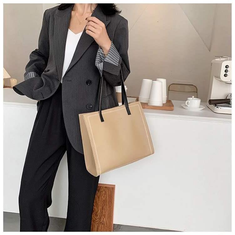 Женская однотонная большая вместительная сумка-тоут для отдыха из искусственной кожи — фото 4