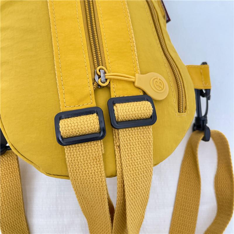 Multifunkční taška přes hrudník Dámský vodotěsný nylonový batoh Lehká crossbody taška na cesty