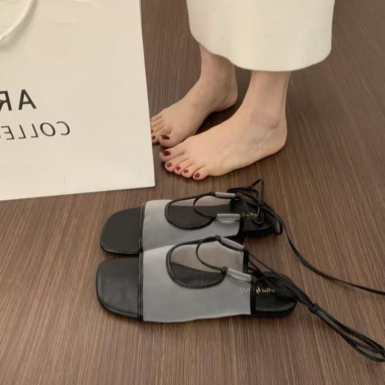 

Модные французские нишевые сандалии с открытым носком, плоской подошвой и дышащей сеткой для женского лета 2025 года, новая повседневная пляжная римская обувь на шнуровке 40 чёрный