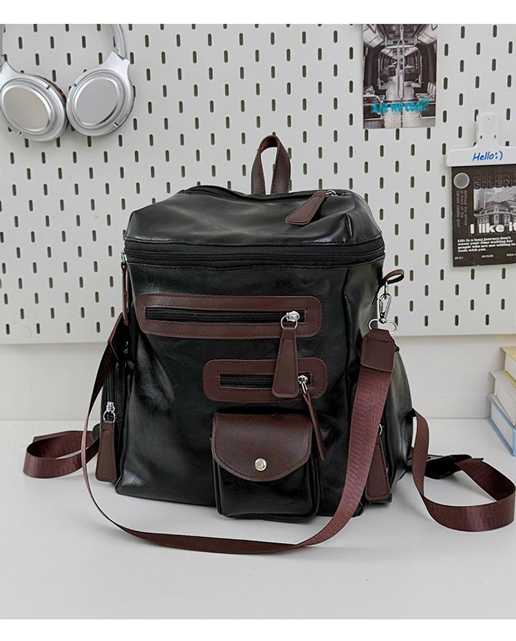 Schoolbag European and American retro silver nail-trimmed backpack couple high street locomotive wind light and versatile class storage backpack