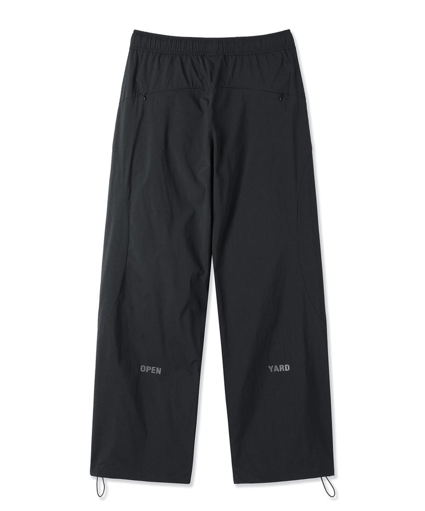 OHY Side Circular Zip High Nylon Pants - Black