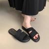 Flat-bottomed slippers women's summer outer wear 2025 new simple casual lazy seaside vacation wind one-word beach shoes