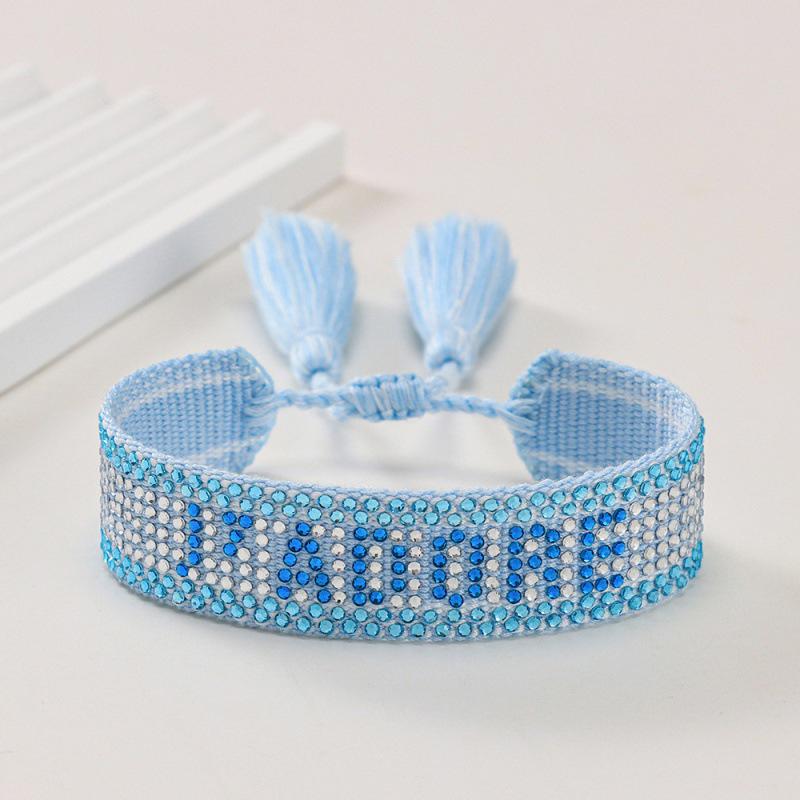 Unisex European Handwoven Tassel Bracelet with Hot-drilled Letter Design