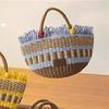 2023 Handmade Woven Straw Bucket Bag: Cute Picnic Basket with Tassel and Wood Bead Decoration