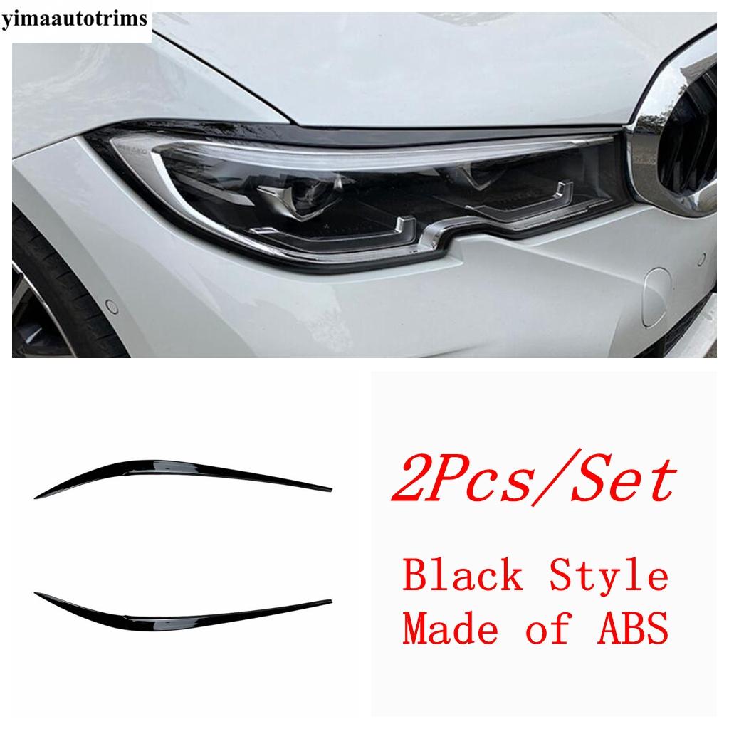 2Pcs Black / Carbon Fiber Headlight Lamp Eyelid Eyebrow Cover Decoration Stickers For BMW 3 Series G20  - 2024 Accessories Black Style