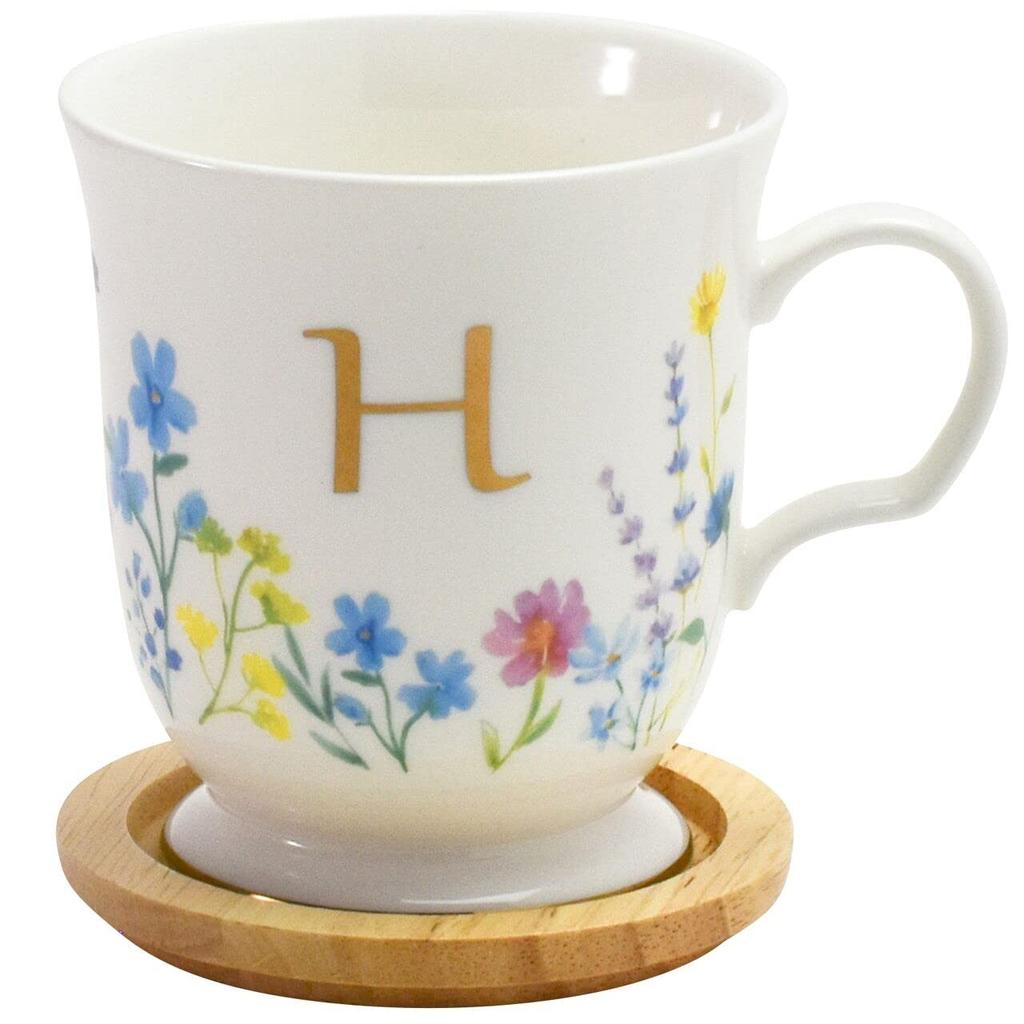 This Elegant 350ml Mug Features a Delicate Floral Design and a Gold Initial It Comes with a Coaster That Doubles As a Lid or Small It Also Comes In a