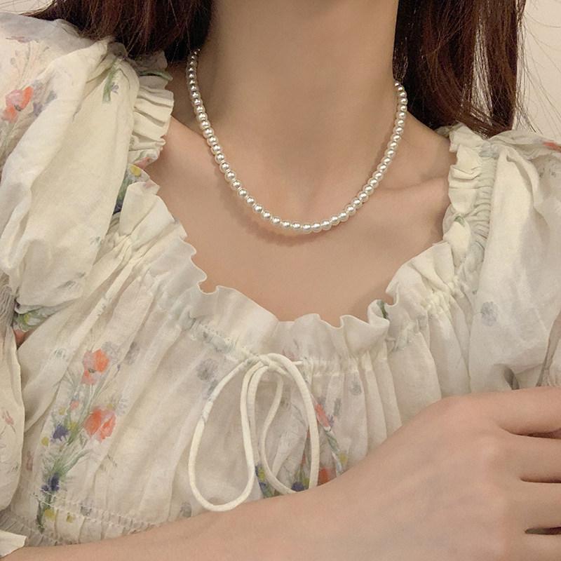 Korean Pearl Necklace: High-End Silver Clavicle Chain with Niche Design, Perfect for Light Luxury and Sweater Pendants.