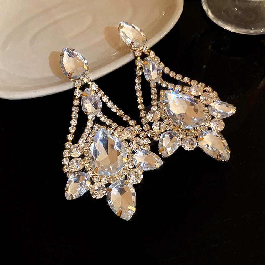 

Silver needle diamond-encrusted water drop pendant earrings simple and fashionable earrings light luxury high-end earrings design sense niche