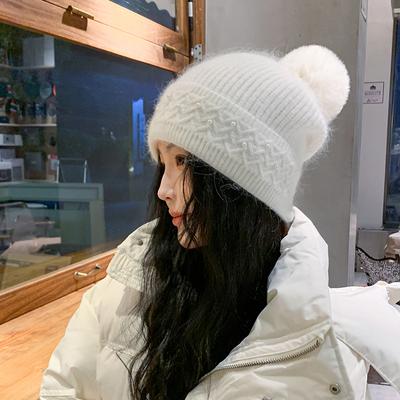 Neue, reine Farbvariante im koreanischen Stil mit niedlicher Kugelkopfmütze für Damen zum warmen Reiten im Winter mit Ohrenschutz und Strickwollmütze