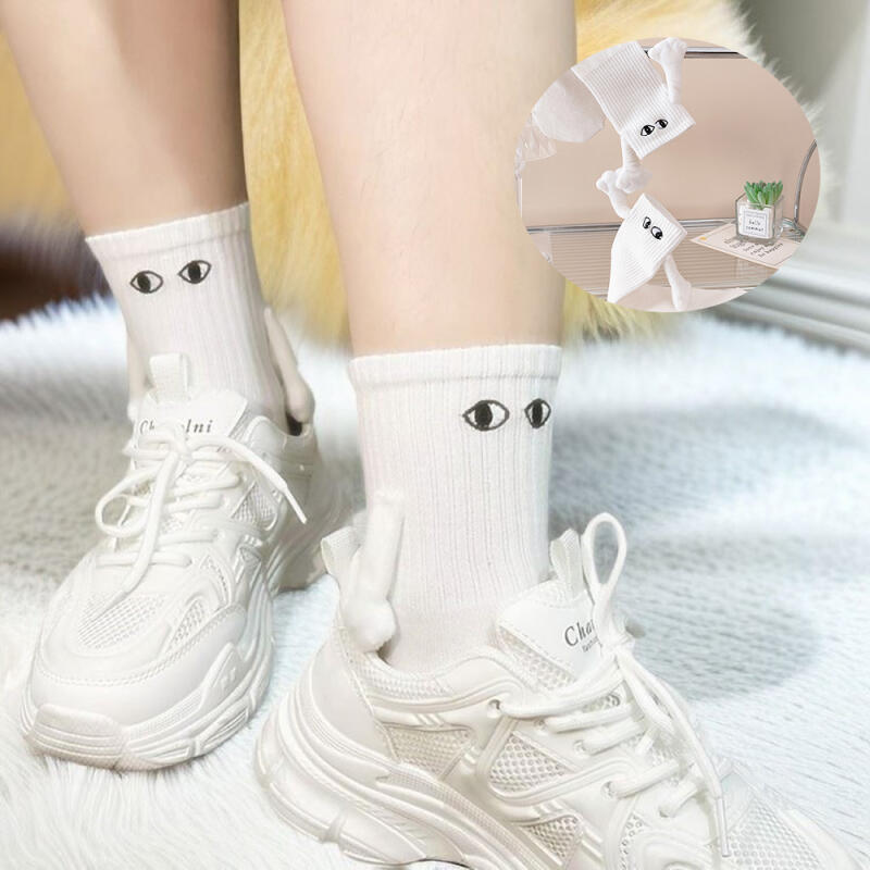 Magnetic socks couple character hand holding socks useless