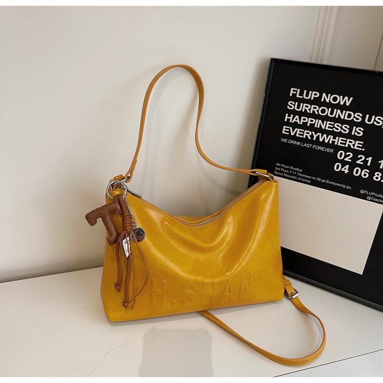 

Large-capacity retro commuter bag women s 2025 new fashion niche one-shoulder crossbody bag casual tote bag