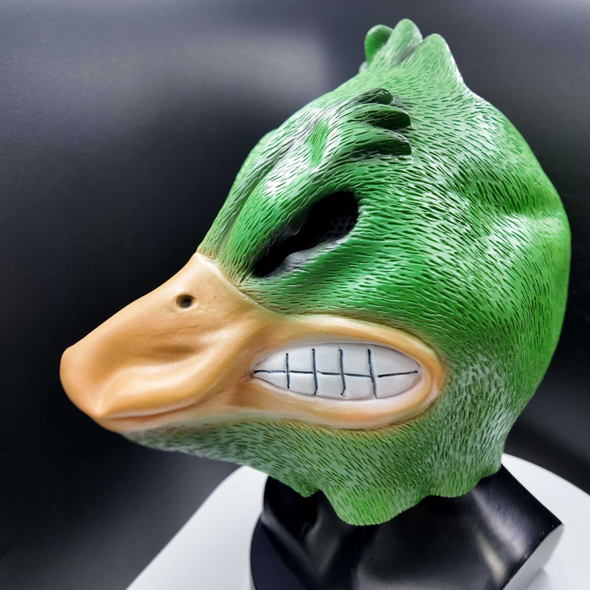 

Halloween Costume Headgear Angry Duck-Green and yellow costume masks can be labeled green duck