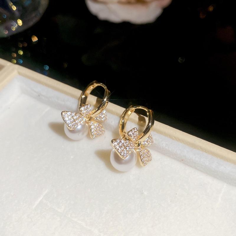 Retro silver needle zircon bow pearl ear buckle necklace set, new light luxury high-end jewelry