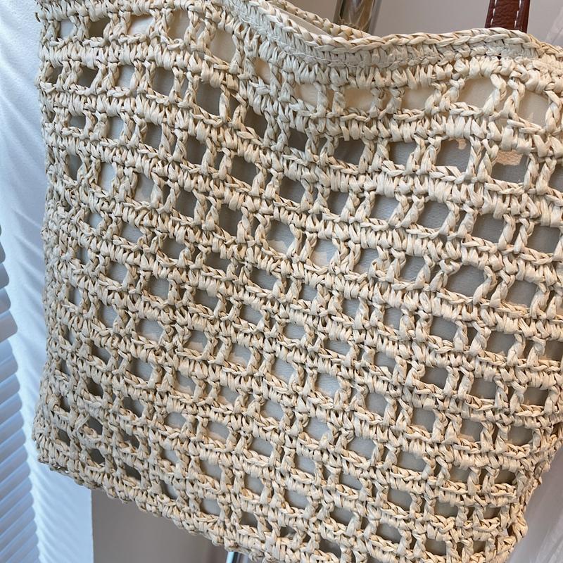 Handwoven Straw Tote Bag with Leather Handles and Open Weave Design Perfect for Summer Beach and Casual Outings