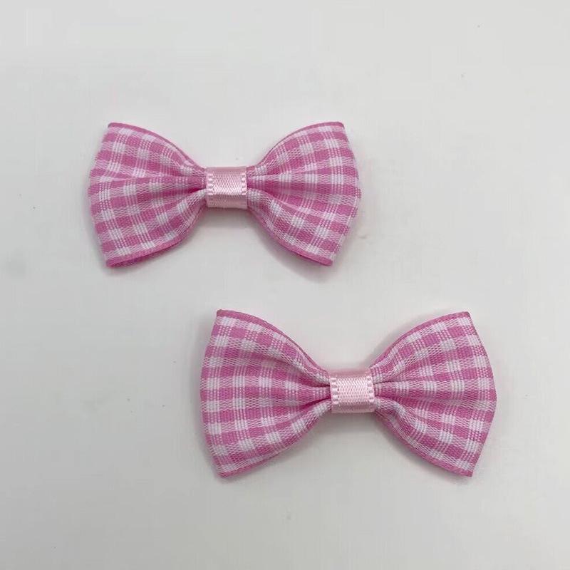 

Решетчатый бант 2,5x4,5 см. Материал для изготовления одежды, аксессуаров для волос, игрушек и украшений.