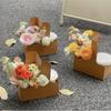 Kaffeebeutel mit Henkel Kraftpapier Material Blumenverpackung Handgehaltene Blumenbox To-Go Verwendung
