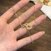 Copper-plated real gold pendant, light luxury imitation chalcedony snake necklace, temperament, fashion, life, versatile accessories direct sales