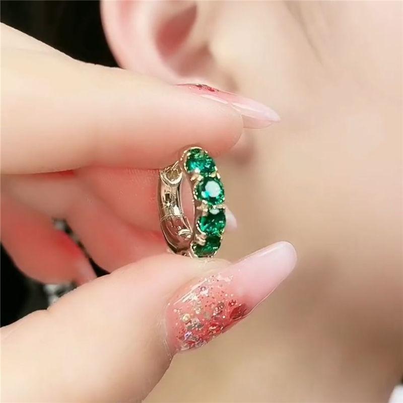 Retro Hong Kong style emerald earrings temperament design sense high-grade green ring ear buckle new light luxury zircon