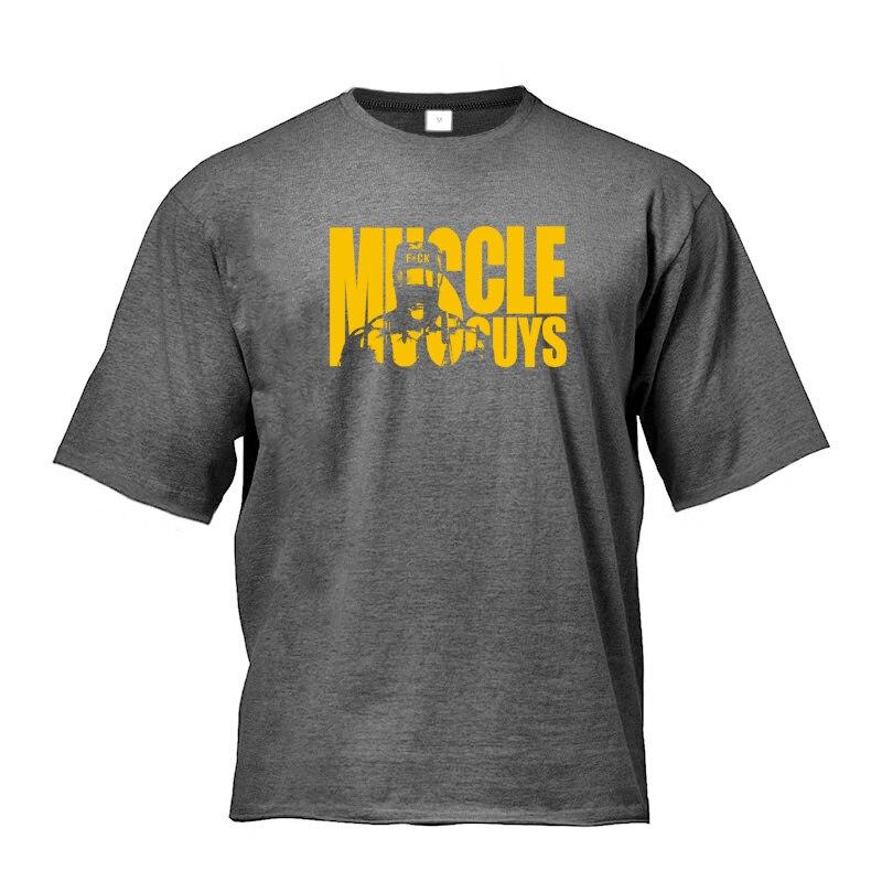 Muscleguys Męskie ubrania na siłownię Luźna czerwona koszulka z krótkim rękawem Letnia do ćwiczeń Kulturystyka Połowa rękawa Trend Moda Streetwear