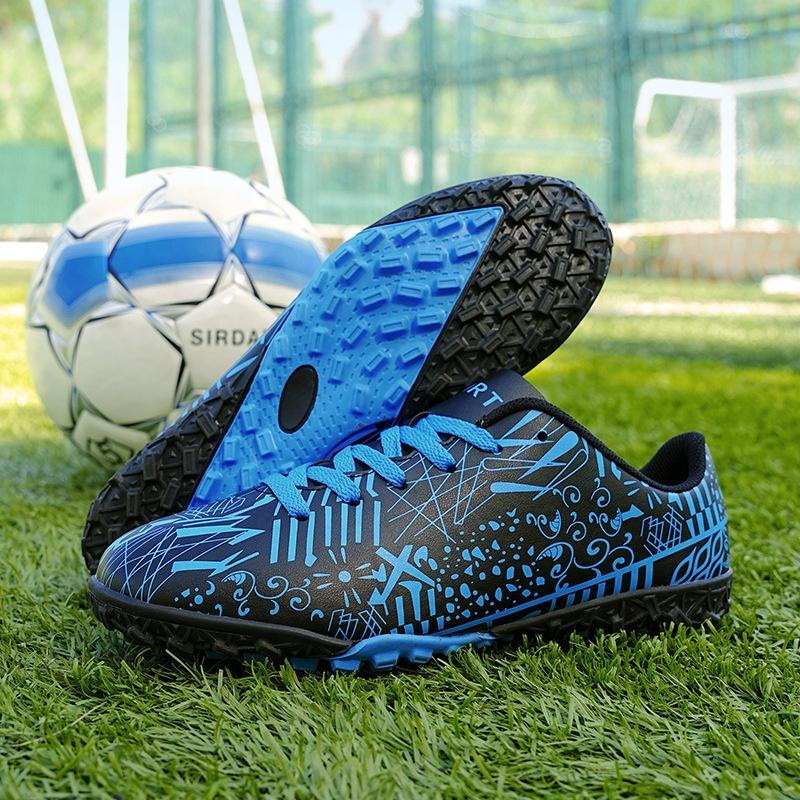 Yuxing shoe factory new football shoes upper T rubber sole waterproof strong grip men and women and children