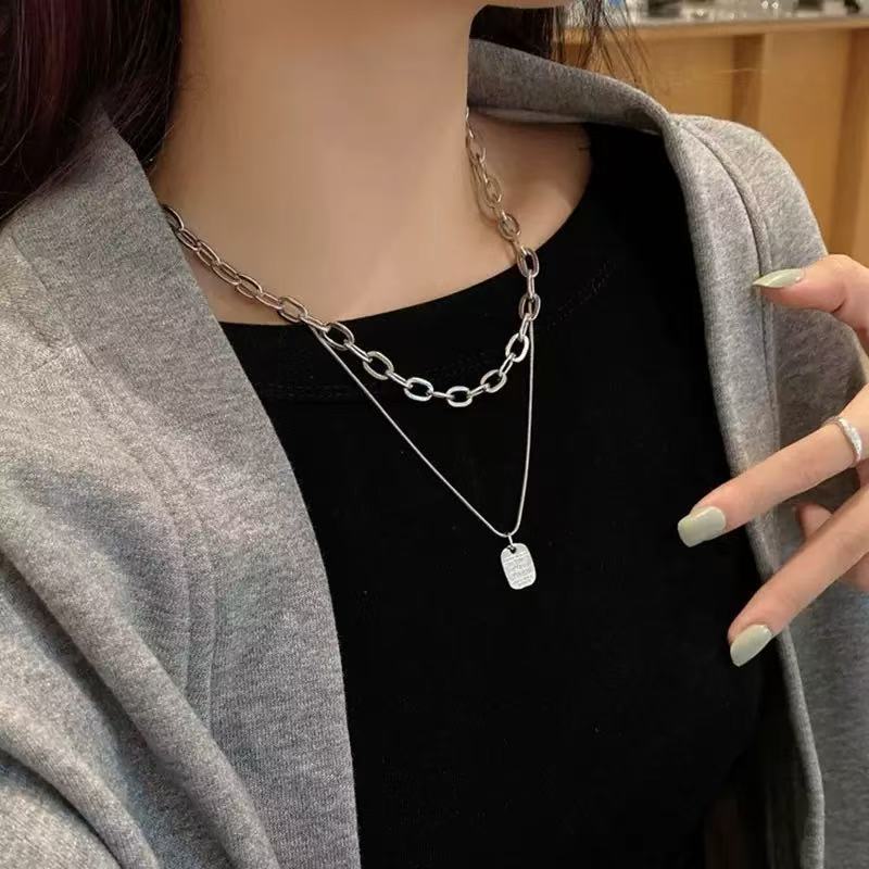 Hollow water drop pendant necklace women do not fade cold wind temperament sweater chain minimalist personality niche accessories design