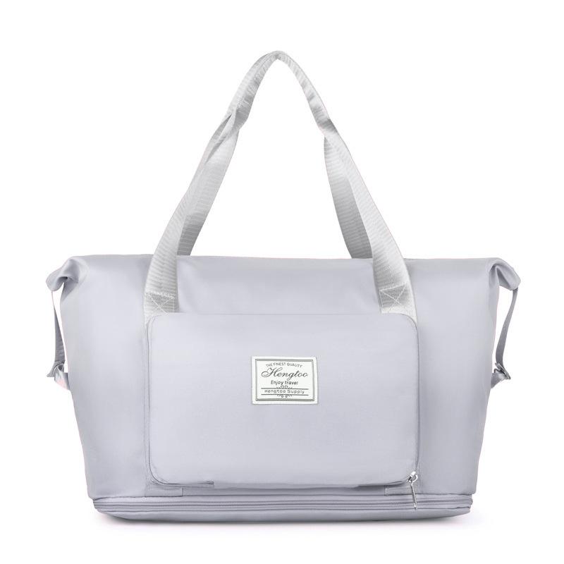 One shoulder foldable storage bag, portable and simple pull rod travel bag, large capacity sports portable fitness bag серый