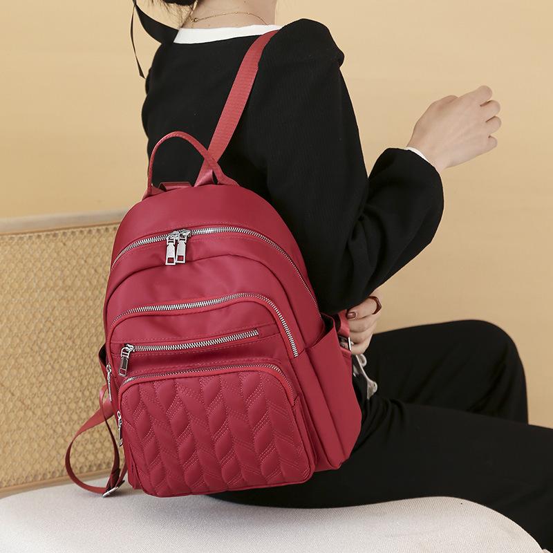 Casual Korean version of women s Oxford backpack fashion simple urban commuter travel backpack красный