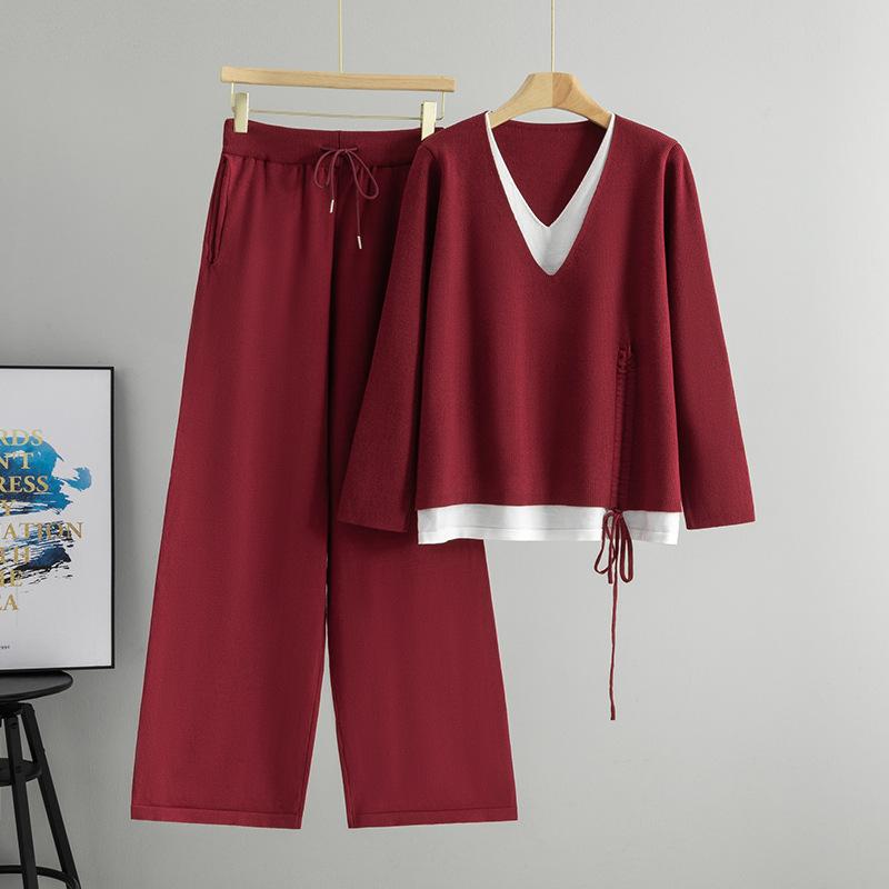 Das Neue Herbst- und Winter-Mode-Set für Damen verfügt über ein Tunnelzug-Design am Saum, einen zweiteiligen Pullover mit gefälschtem V-Ausschnitt und eine Hose mit weitem Bein.
