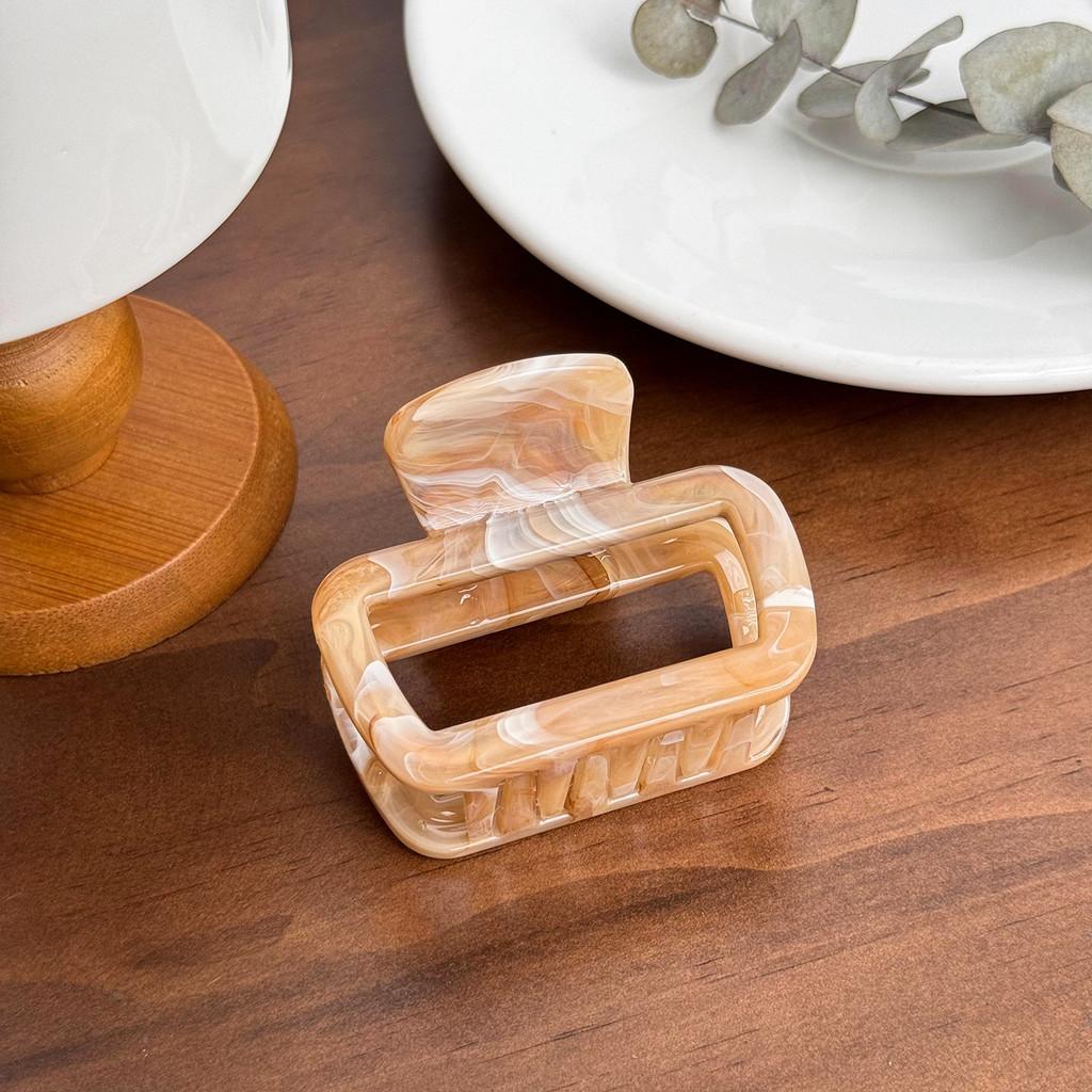 

Stylish Large Pc Material Hair Clutch With Eye-catching Marble Finish For Women Square Brown 6.5cm