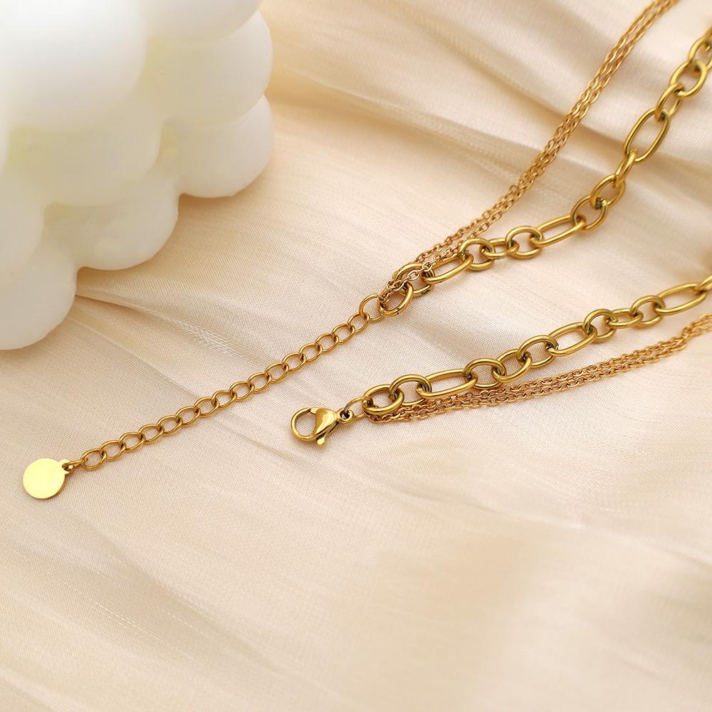 Women's Luxurious Layered Necklace with Black Bead and Sun Pendant – Versatile Three-Layer Design