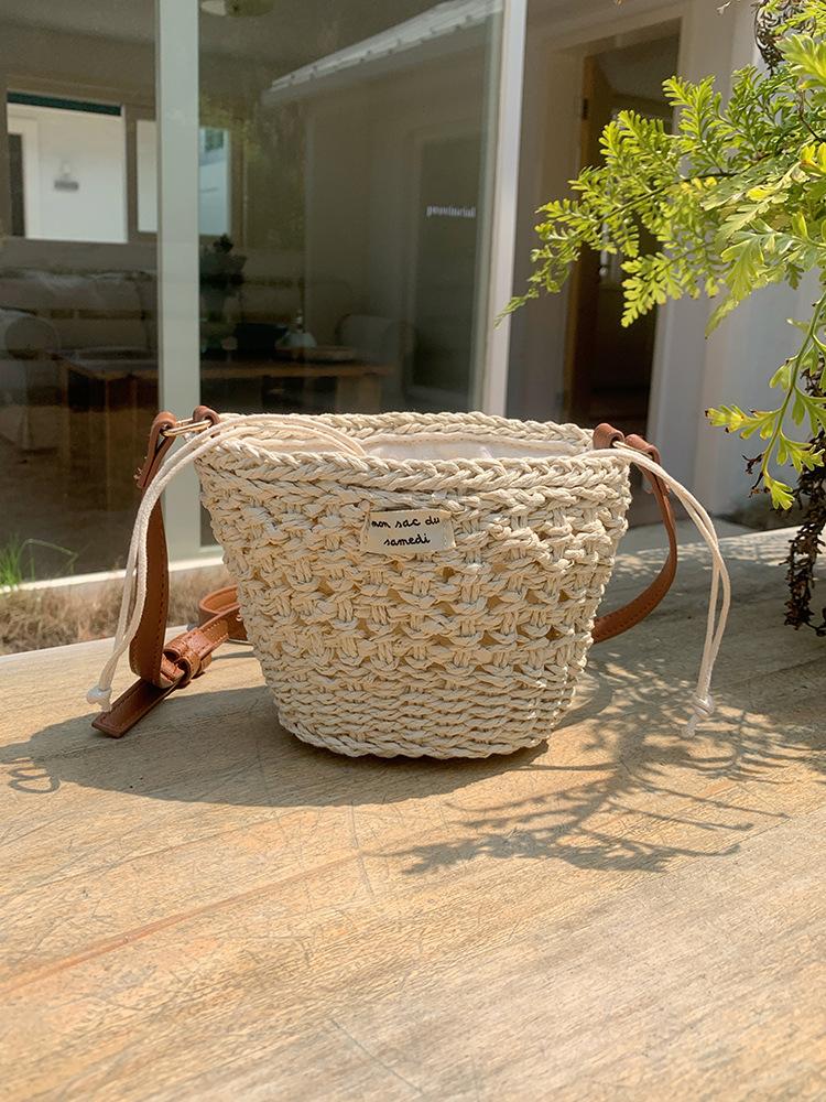 Cute bucket crossbody straw woven bag new small fresh hollow shoulder woven bag vacation beach bag versatile women's bag