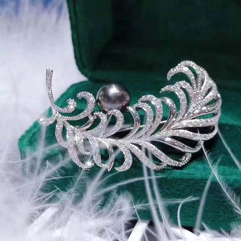 Gold-Plated Feather Brooch with Zircon and Pearl Detailing