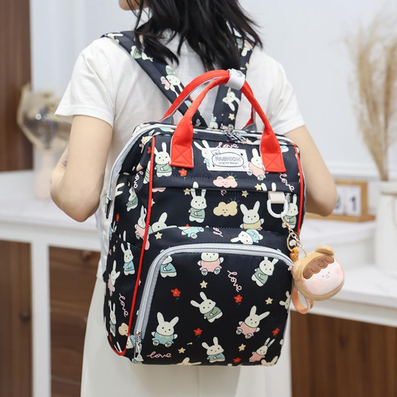 New Fashionable Multi Functional Large Capacity Handheld Backpack for Moms Going Out Lightweight Mother and Baby Bag
