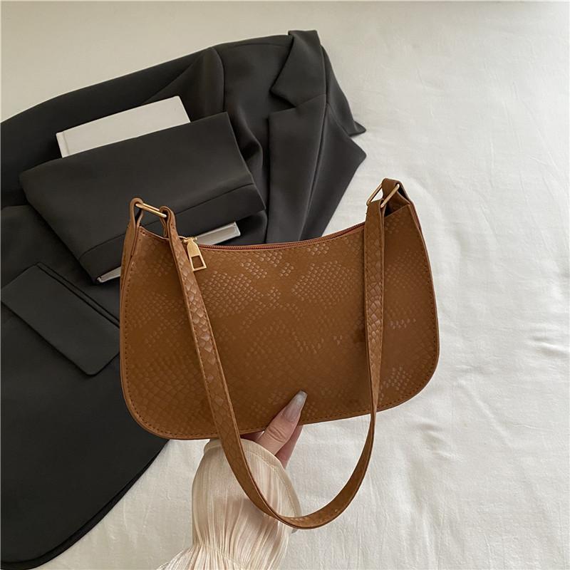 This year's popular bag women's 2025 new trendy fashion Korean version portable small square bag foreign gas snake pattern shoulder armpit bag