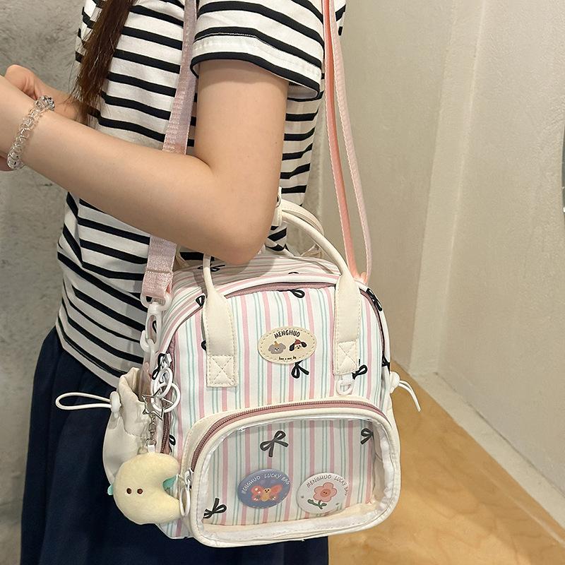 Schoolbag new Japanese ins high value fresh and sweet plaid lazy wind transparent pain bag girl mini backpack