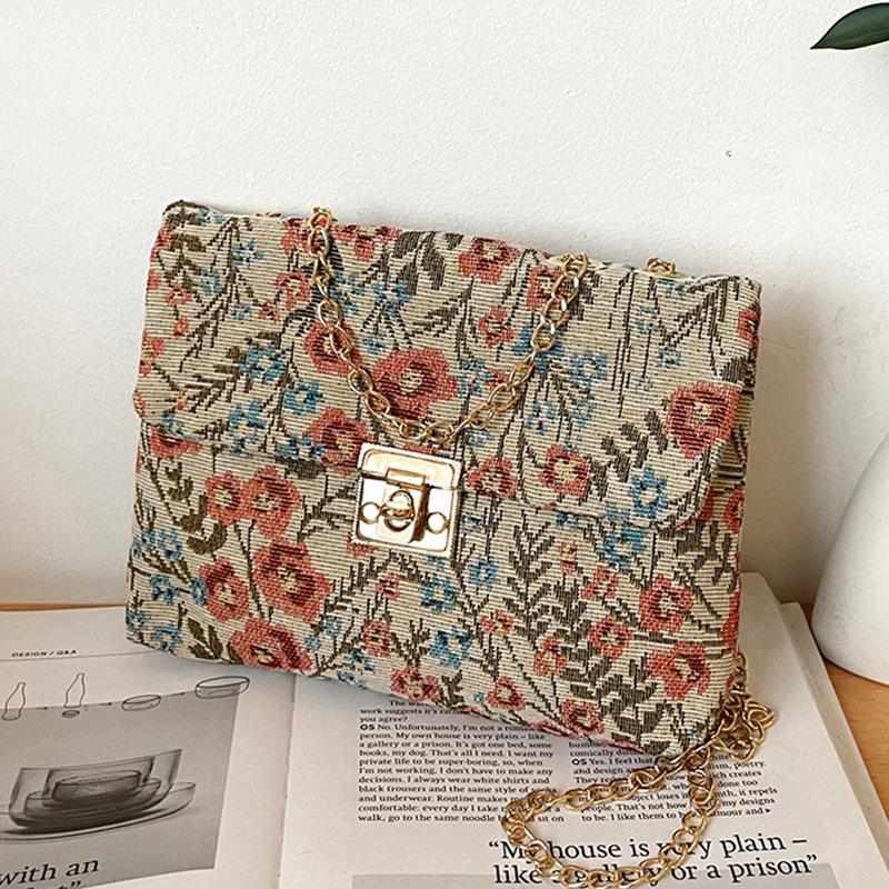 

Korean version envelope bag 2025 summer new ethnic style flower fashion clutch bag trendy cool casual foreign style handbag розовый